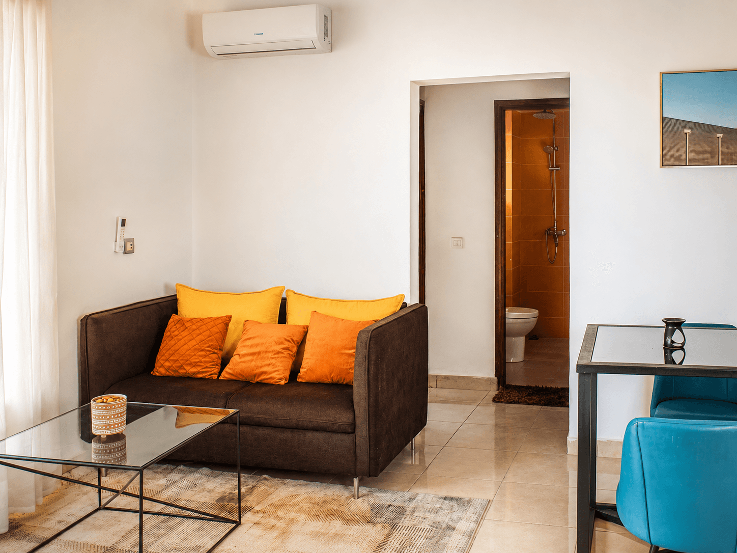 Lounge with sofa and bathroom view